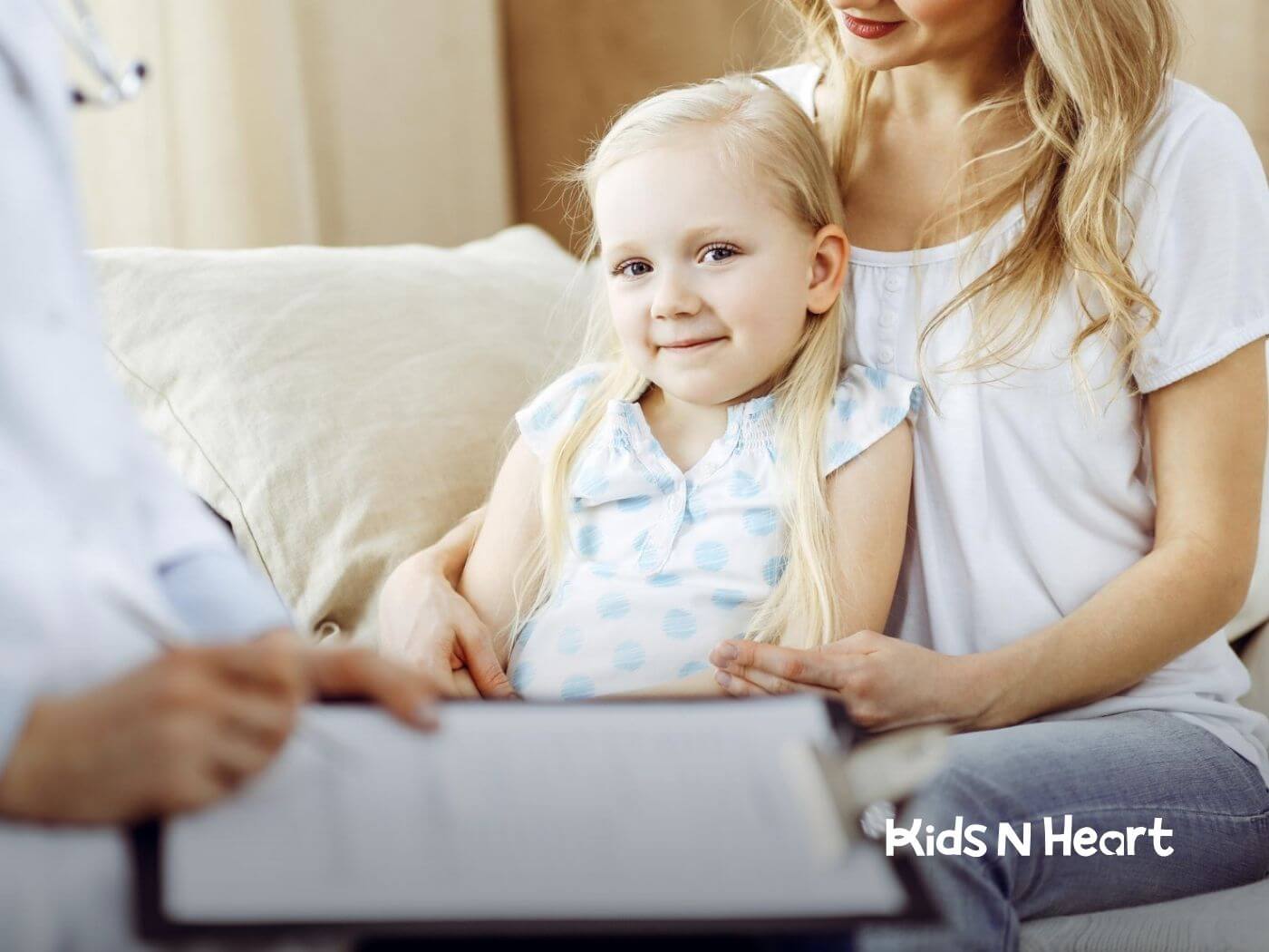 Parent helping autistic child with homework at home.