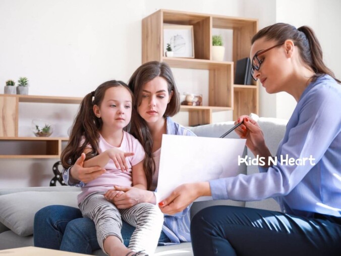 Parent helping autistic child with homework at home.